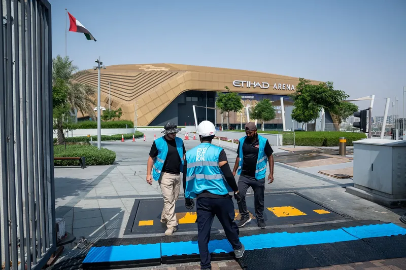 Evolution Site crew preparing temporary site infrastructure at Etihad Arena