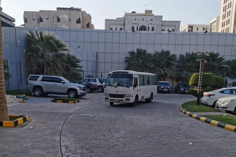 Event operations vehicles parked within a managed site area