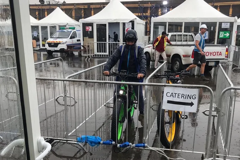 Catering access route controlled with temporary pedestrian barriers