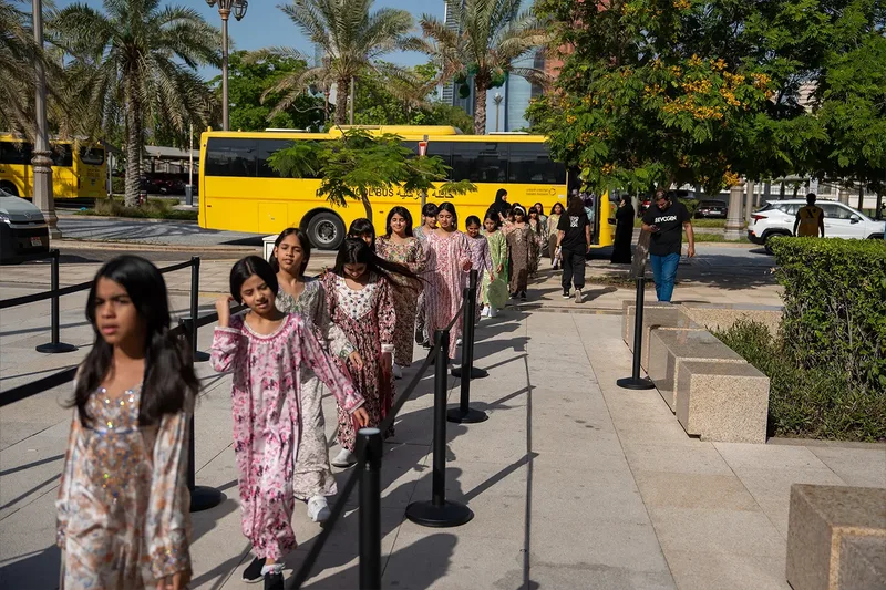 Guests arriving by coach at a managed event transport area