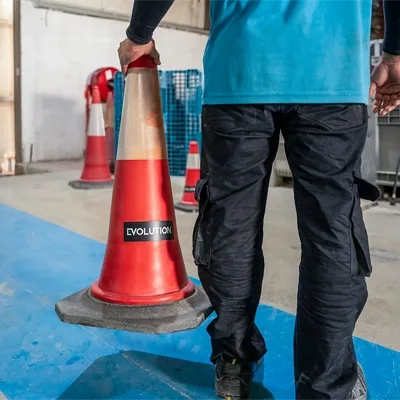 Traffic cone marking a controlled event site area