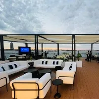 Temporary hospitality lounge with covered outdoor seating