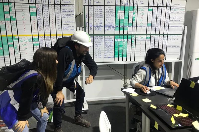 Event operations team coordinating from a site control room
