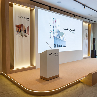 Premium product launch presentation with custom stage and digital display