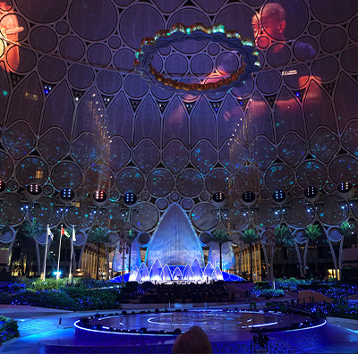 Large-scale outdoor launch event with immersive stage production and lighting