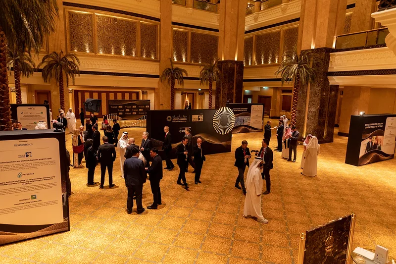 ADIPEC Awards reception and networking area in Abu Dhabi with branded displays, delegates and formal event hospitality