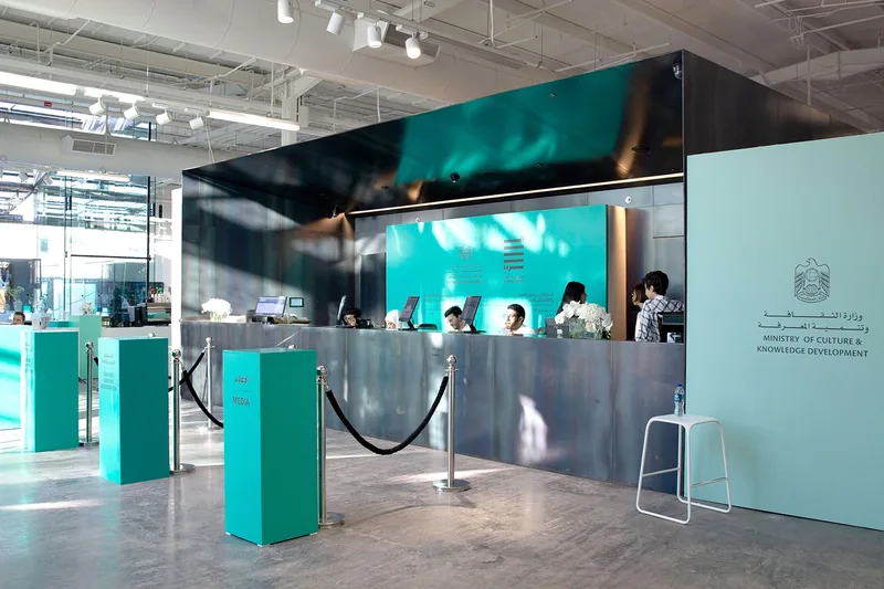 Al Burda Festival guest reception and registration area with custom event branding and hospitality desk