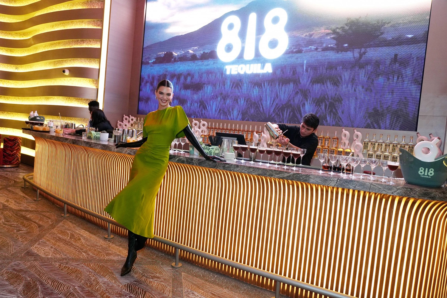 818 Tequila branded bar activation at Atlantis The Royal in Dubai with Kendall Jenner, illuminated bar design and product display