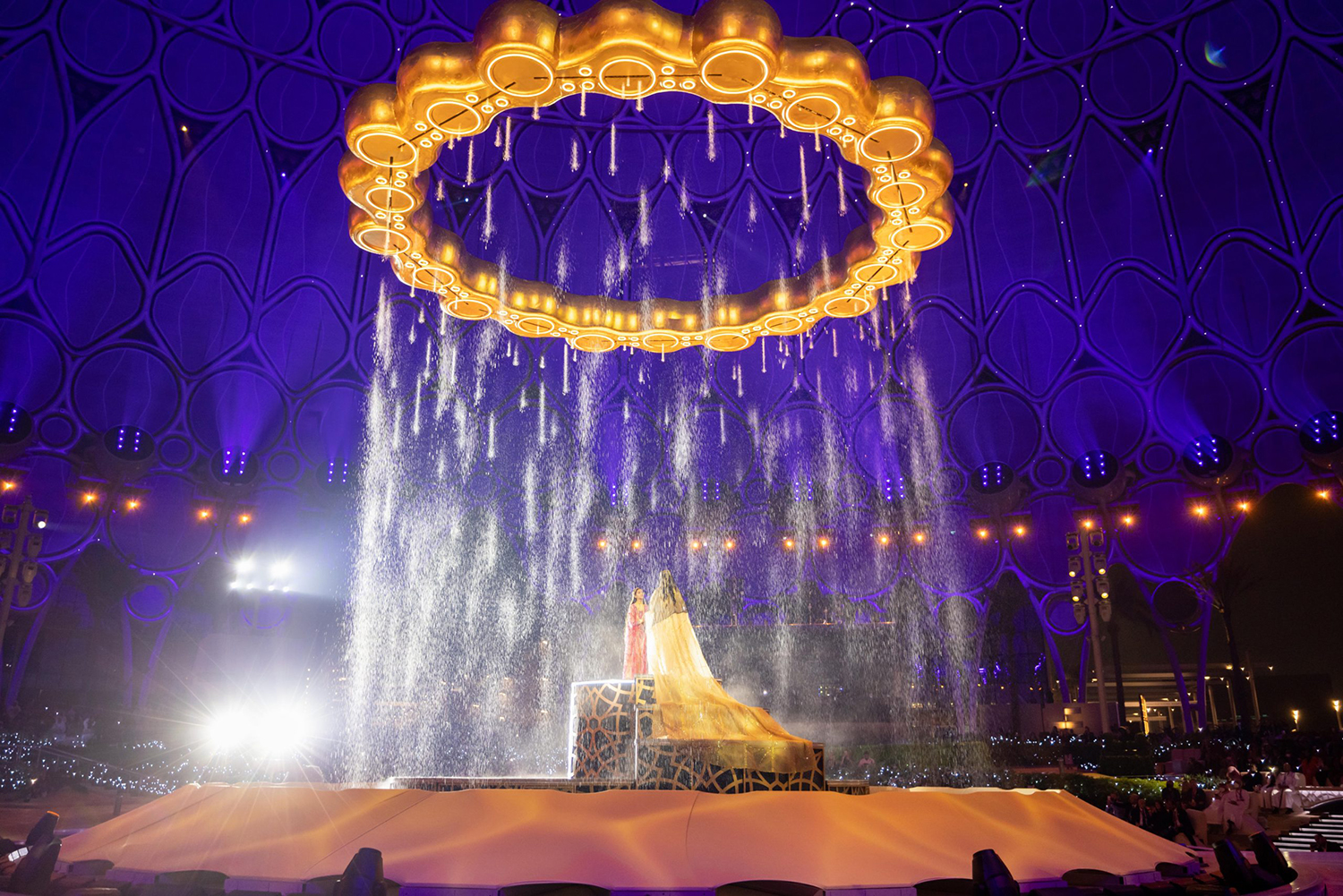 Expo 2020 Dubai closing ceremony gold ring rain curtain combining scenic engineering, rigging and show production