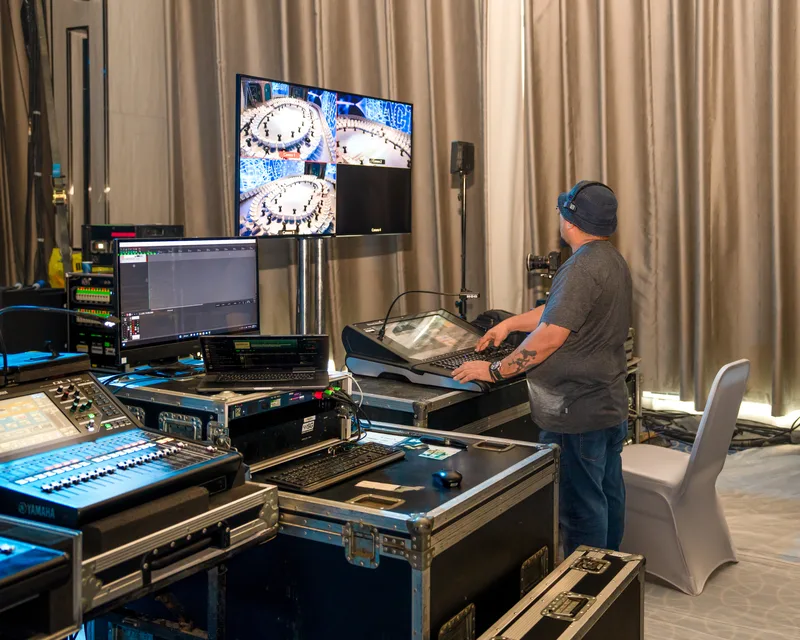 Live video and technical control station at ENACT Majlis with multi-screen monitoring and production equipment