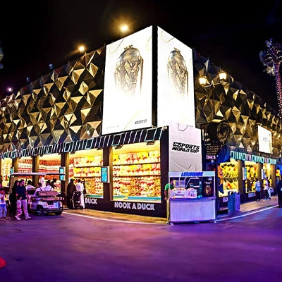 Esports World Cup 2025 merchandise and retail pavilion with illuminated façade, branded displays and visitor access