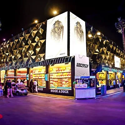 Esports World Cup 2025 merchandise and retail pavilion with illuminated façade, branded displays and visitor access