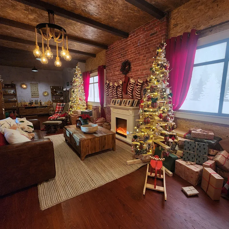 Festive Santa’s house living room with Christmas tree, fireplace, wrapped gifts and sustainable interior styling