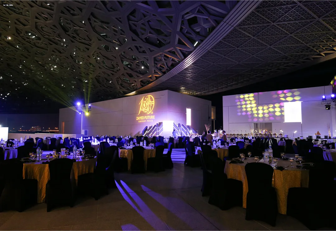 Abu Dhabi Sustainability Week gala dinner with formal dining, event furniture, lighting and stage production