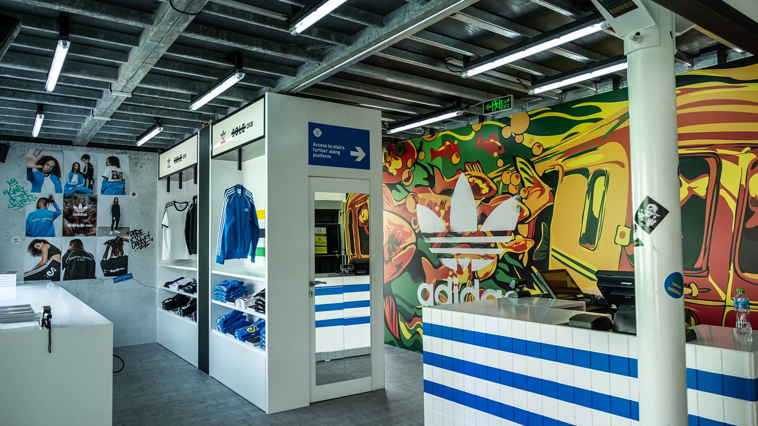 Adidas Originals immersive retail environment at Sole DXB with graffiti graphics, product displays and branded checkout area