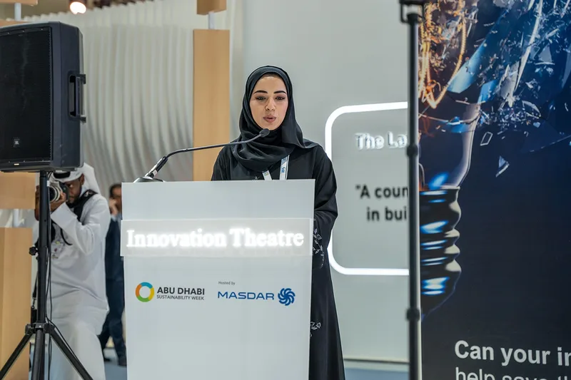 Speaker presenting at the FoodTech Challenge Innovation Theatre during Abu Dhabi Sustainability Week with branded stage and digital content