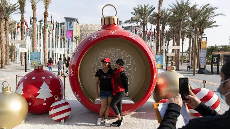 Oversized Christmas bauble photo opportunity at Expo 2020 Dubai with festive public activation and guest interaction