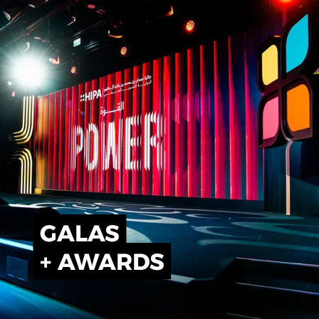Awards and gala event stage with large LED screens, scenic production and theatrical lighting
