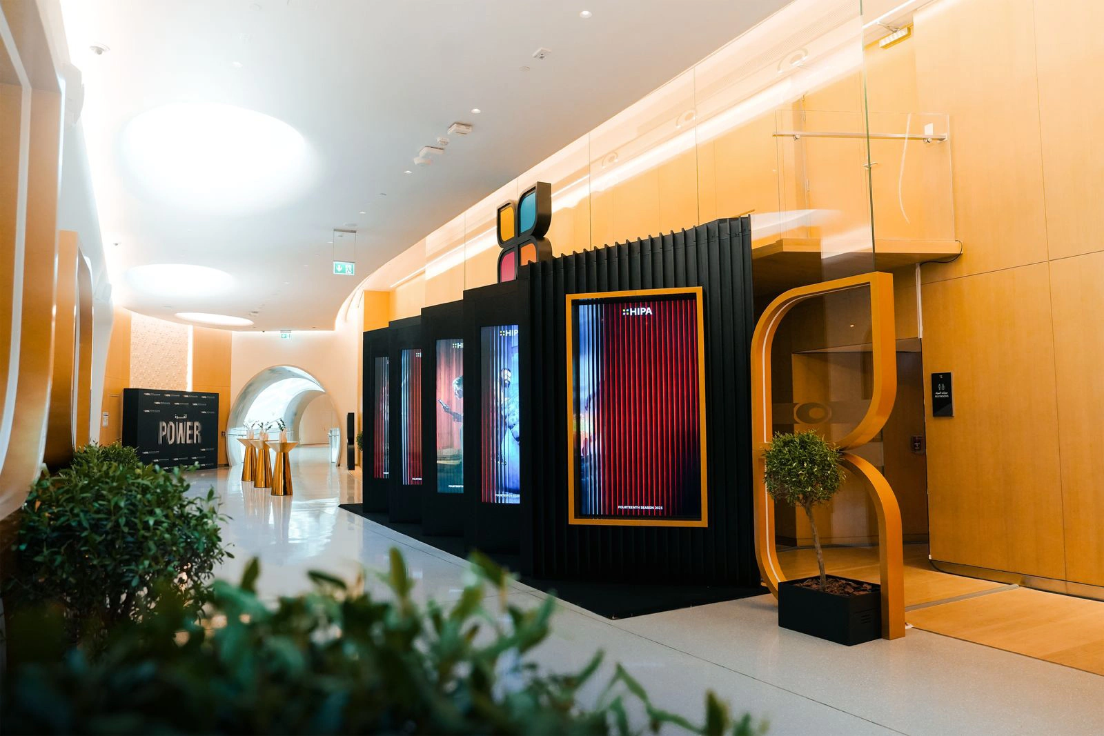 Event installation with digital display panels and guest experience features