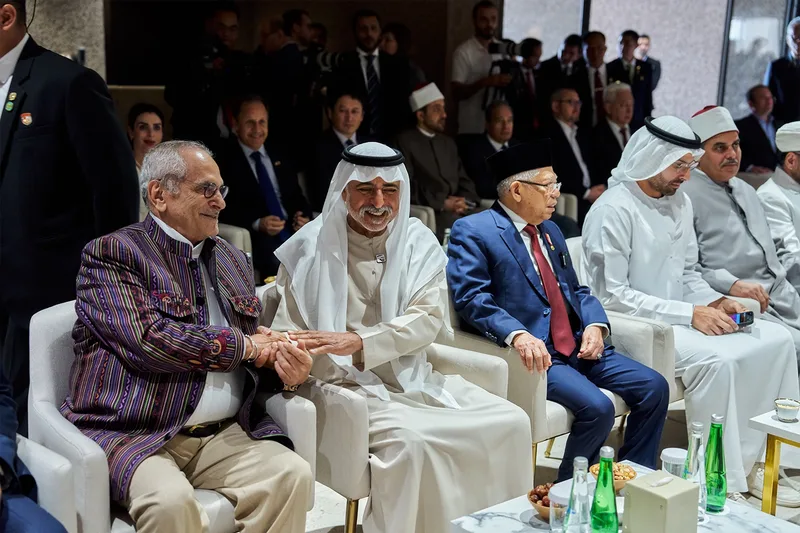 Senior international delegates seated together during a formal government event in the UAE