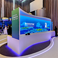 Interactive exhibition stand with immersive digital display and custom branded environment