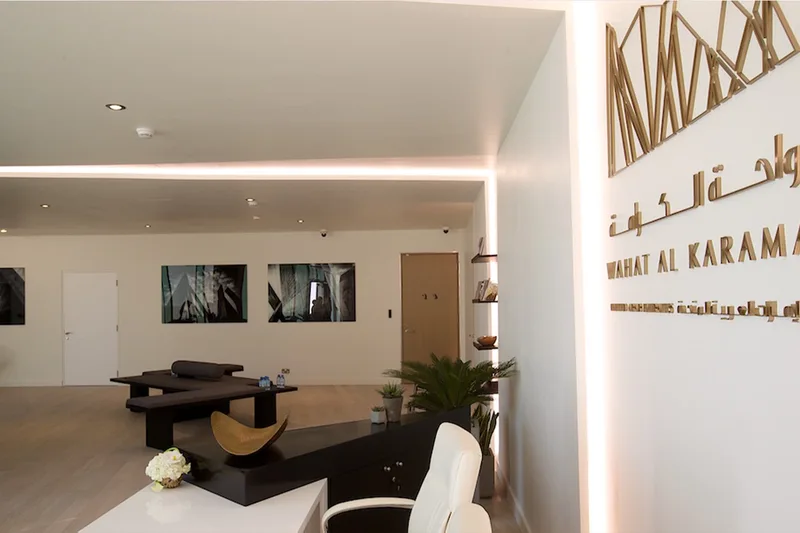 VIP hospitality and protocol lounge prepared for a government event with reception desk, seating and discreet lighting