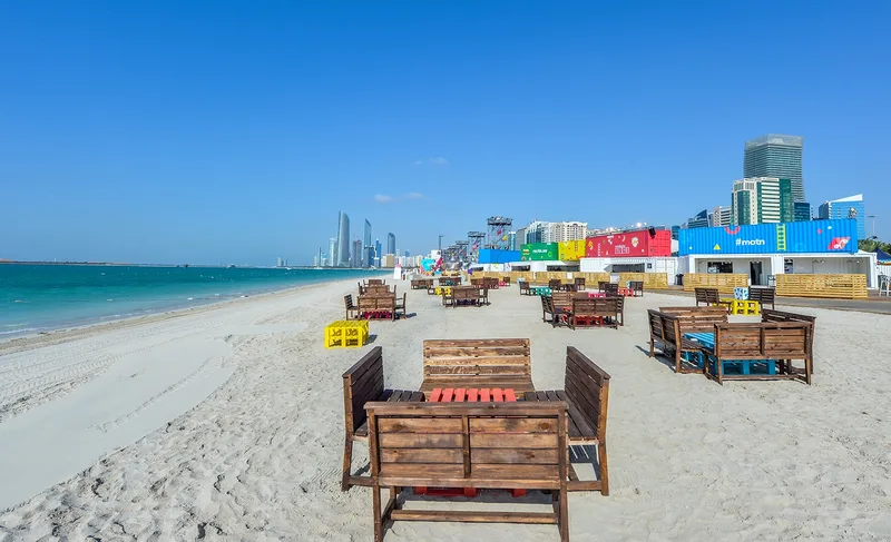 Mother of the Nation Festival beachfront event site in Abu Dhabi with outdoor seating, colourful structures and public spaces
