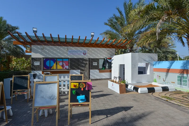 Mother of the Nation Festival cultural exhibition area with framed displays, scenic structures and visitor walkway