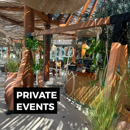 Private event setting with natural materials, landscaped décor and intimate guest hospitality