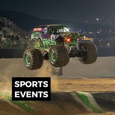 Live motorsport event featuring monster trucks and large-scale event production