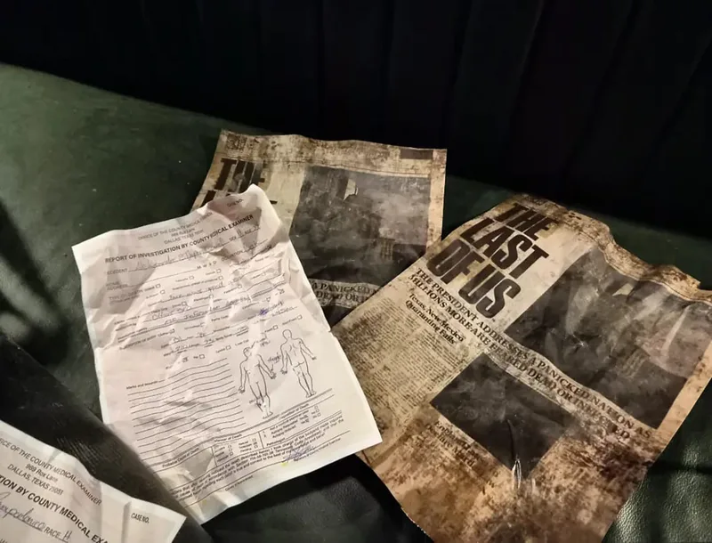 Distressed printed documents and newspapers providing detailed post-apocalyptic environmental dressing