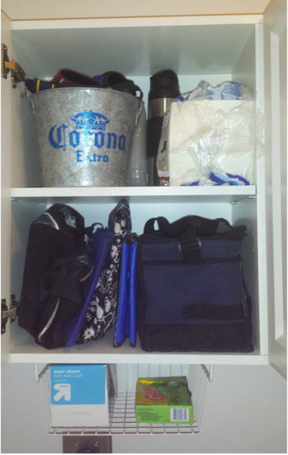 laundry room cabinet after organzing