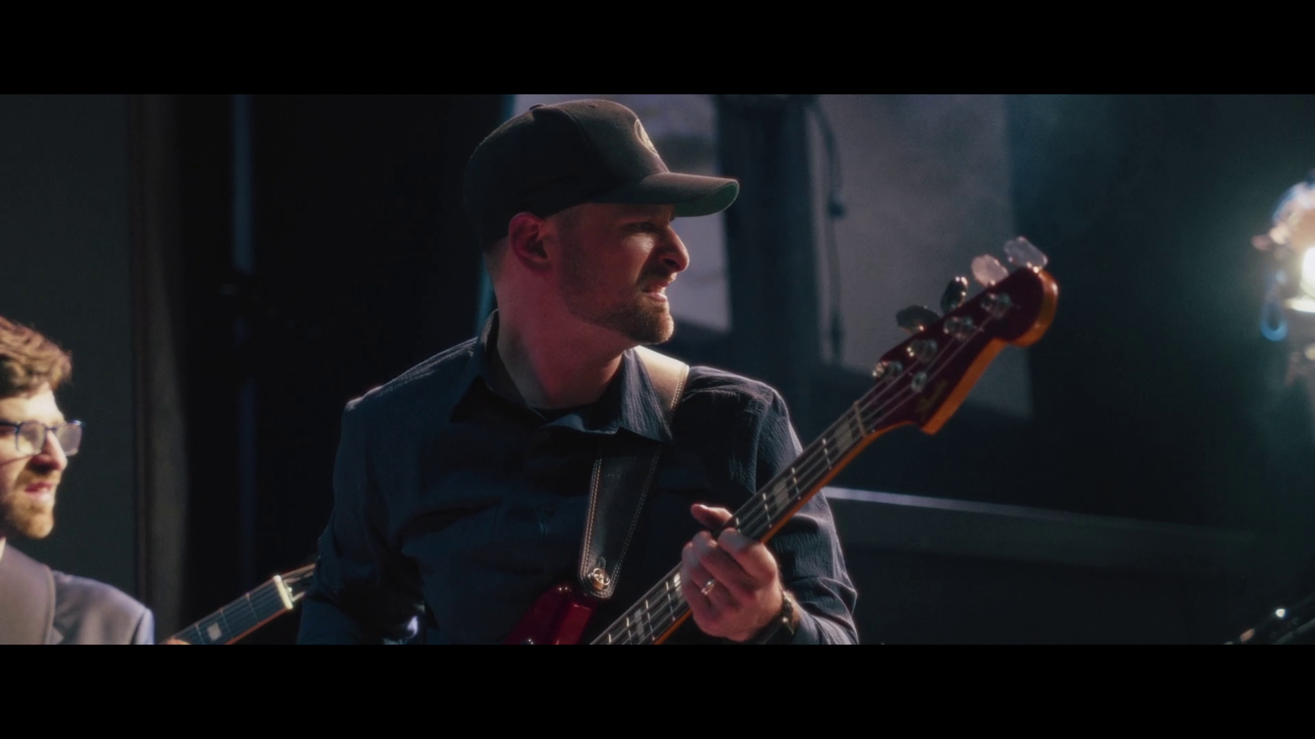 Dylan Hughes performing live on electric bass