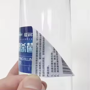 Transparent peel-back double sided sticker label sample showing back print layer for instruction and warning label use.