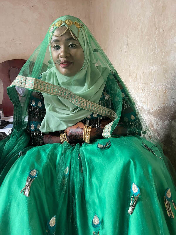 穿著綠色禮服的新娘 Halima