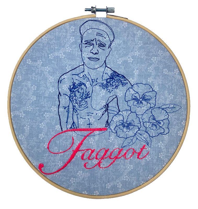 Embroidered self portrait on a pale blue, floral fabric. Embroidered pansies. Machine embroidered text spelling the word Faggot, displayed in an embroidery hoop.