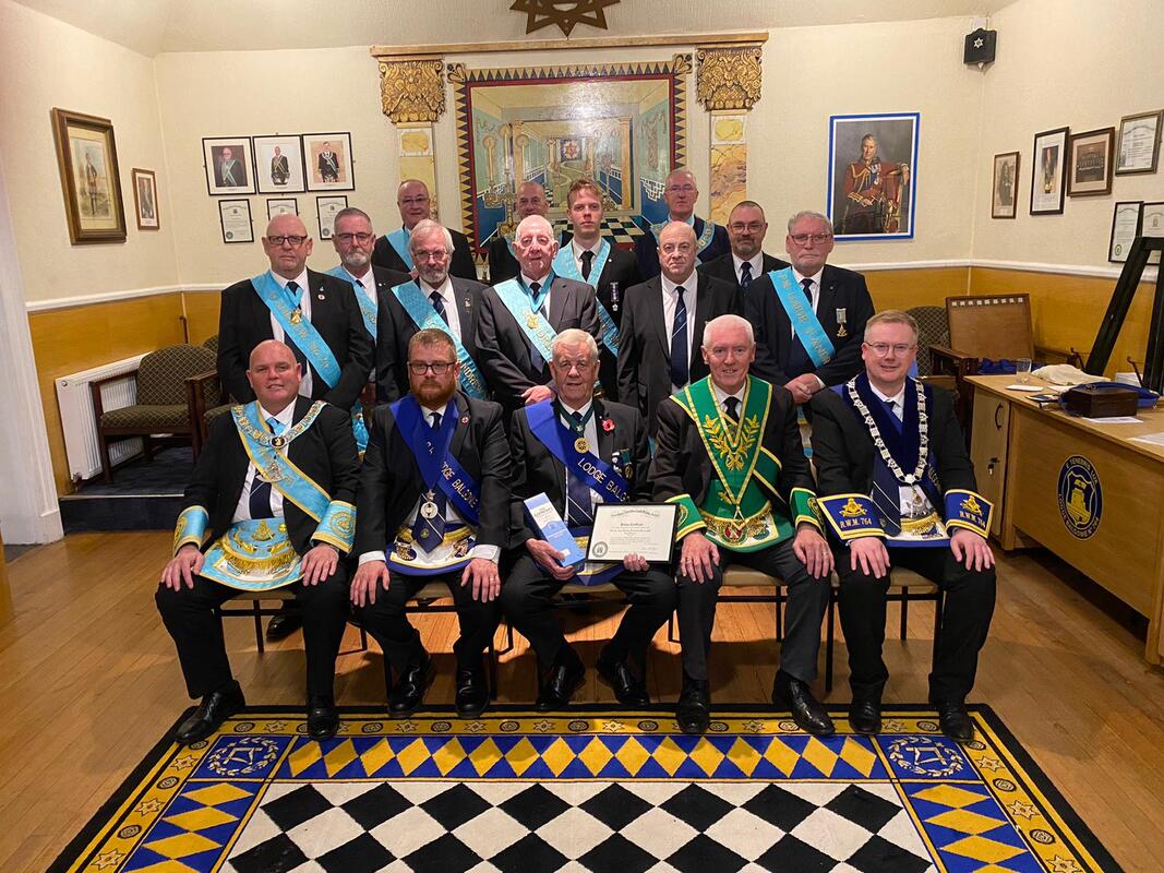brother jack harley pm receiving his 50th year certificate and jewel