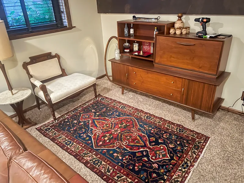 Rug around antique furniture.