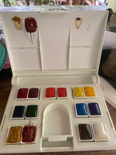 watercolor-kit-intact-with-melted-paint.jpeg