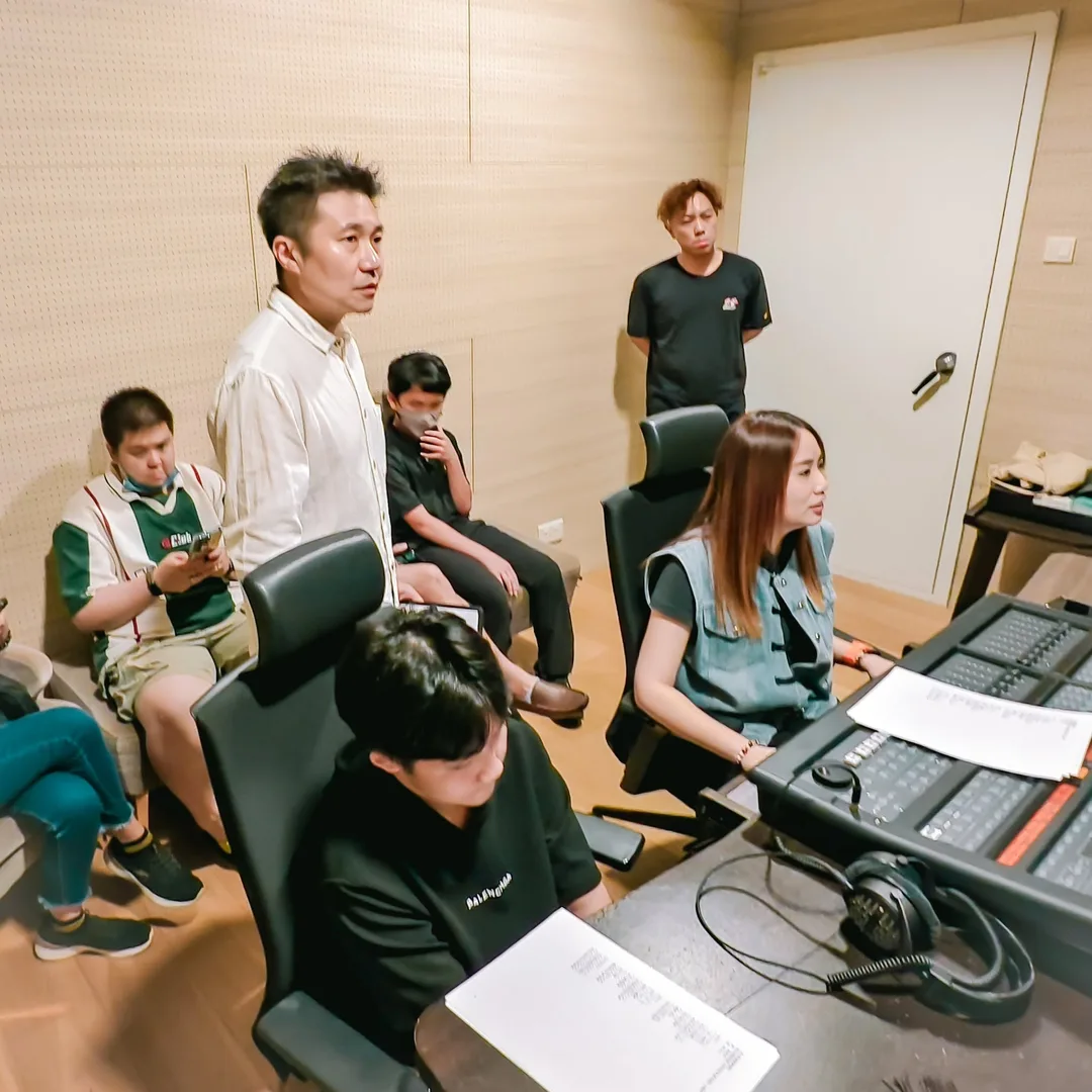 Haha Music team during a music production session in Singapore