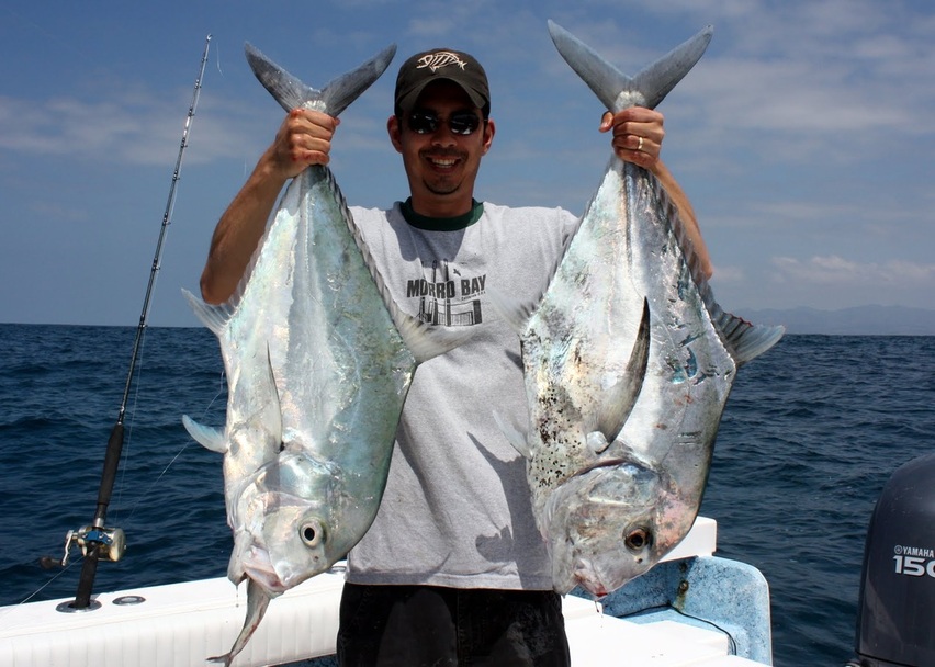 Two African Pompano caught in Puerto Vallarta, Mexico.  One of them wouldn't let go of the bait.