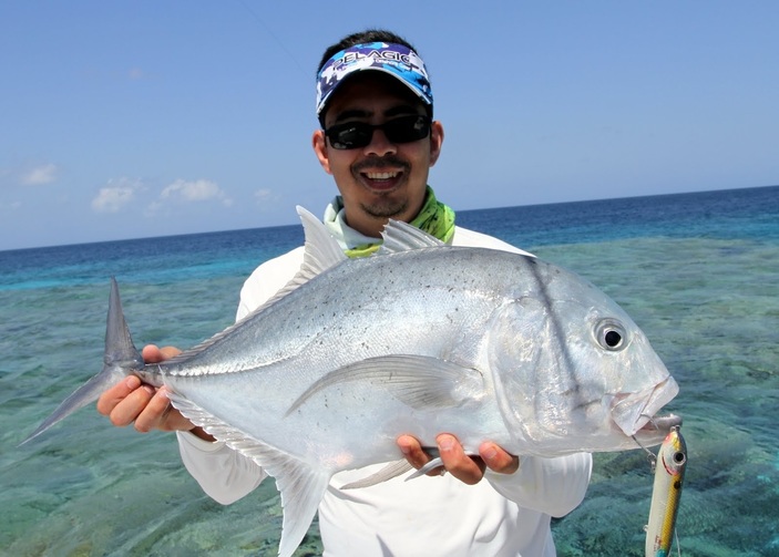 A small Giant Trevally taken on a Super Spook on the Great Barrier Reef, Australia