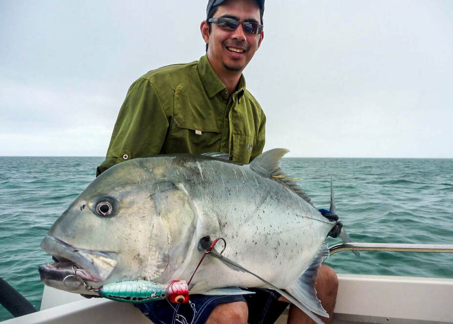 The author with a Giant Trevally caught in Nekweta, New Caledonia