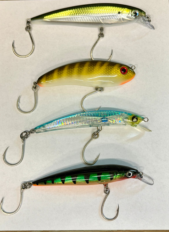 Top to bottom: Rapala X-Rap, Borboleta Safada, Yo Zuri Crystal Minnow, smaller Rapala X-Rap