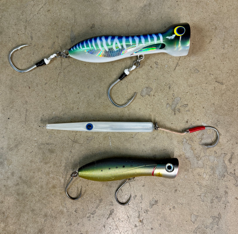 Some topwater lures that work for Roosterfish - Nomad Chug Norris, GT Ice Cream, Yo Zuri Sashimi Bull. The last one can be skittered across the top or chugged, making it versatile