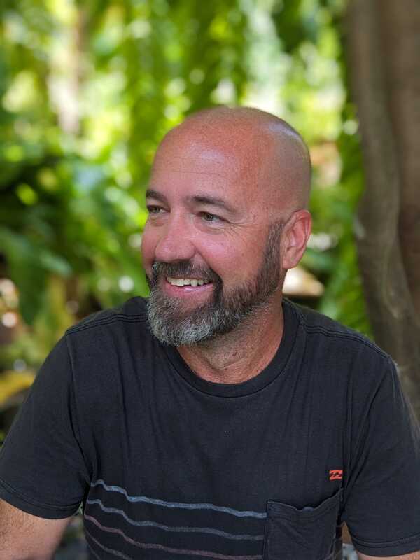 will north owner of ocean sound koh tao having a morning coffee
