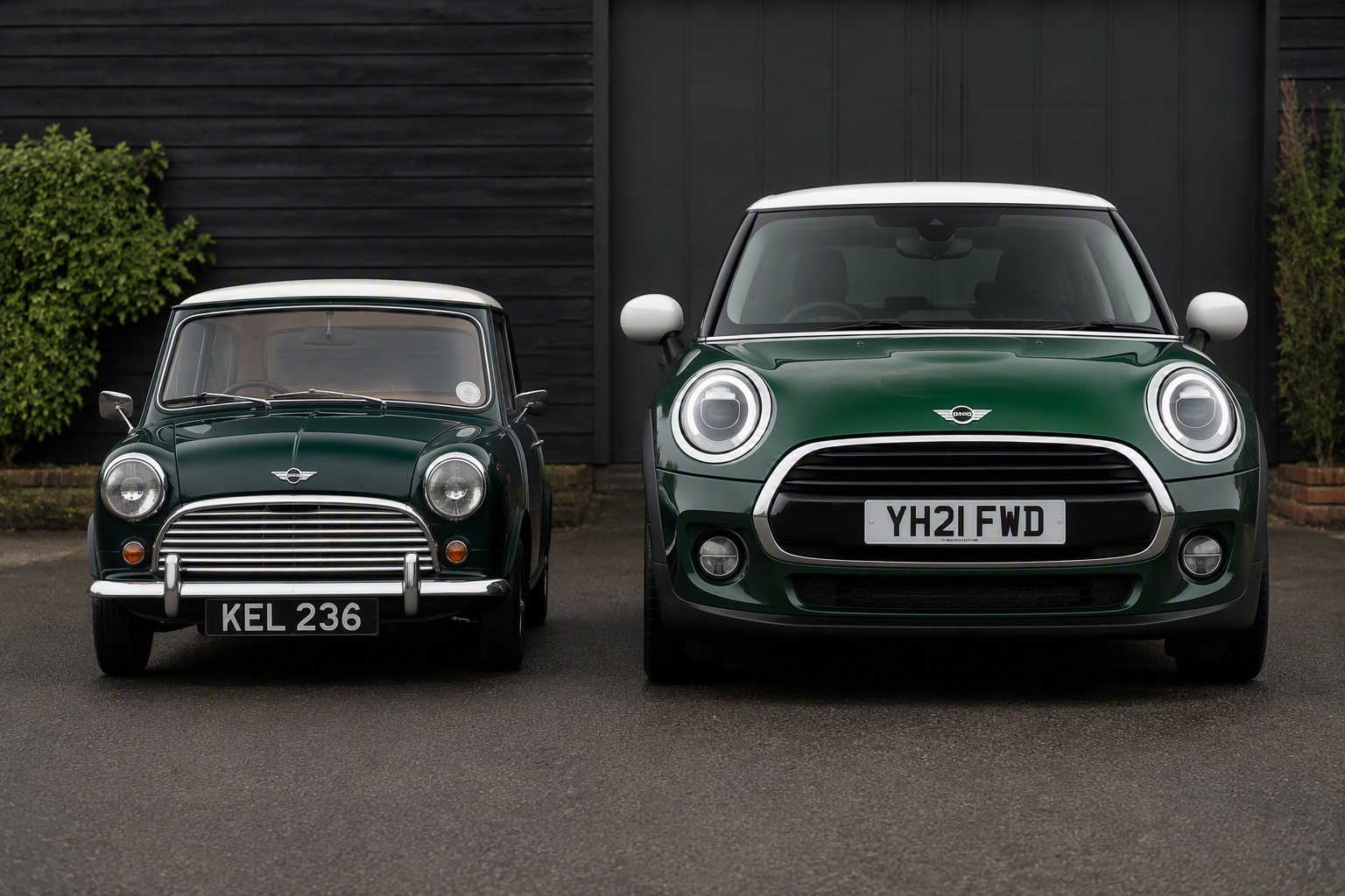 A 1960s green mini side by side with a current one
