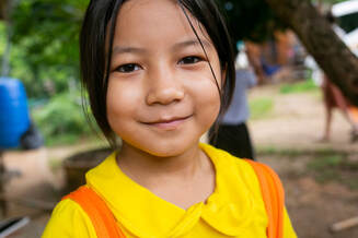 Young hill tribe girl born into poverty now has a chance to thrive and succeed.