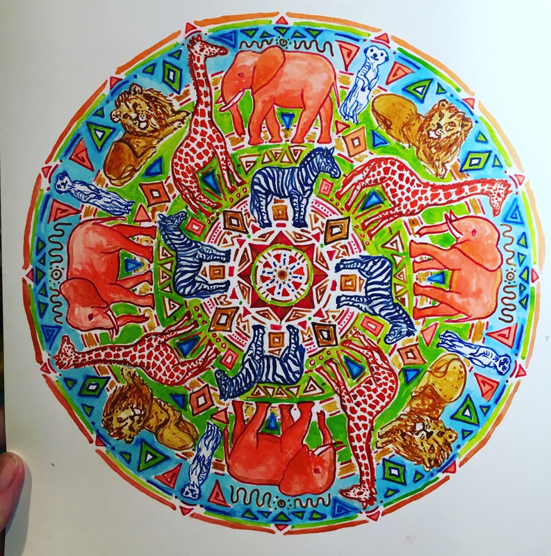 hand drawn pen and ink mandala with zebras, elephants, giraffes, lions, meerkats