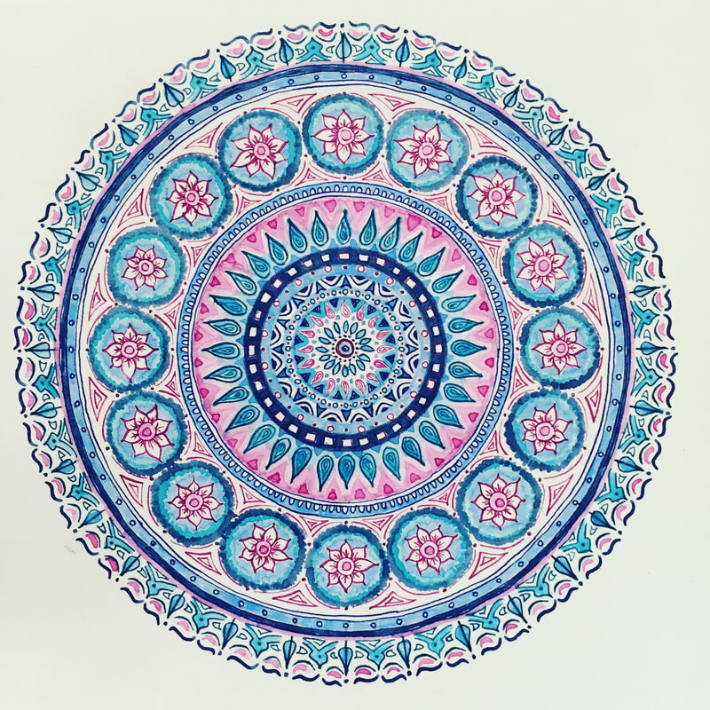 hand drawn pen and ink mandala with flowers